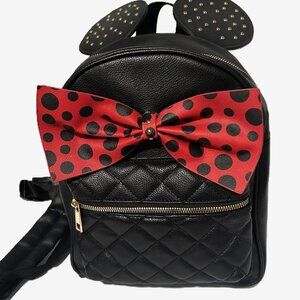 Olivia Miller Minnie Mouse Mini Backpack with a red and /black Polka Dot Bow